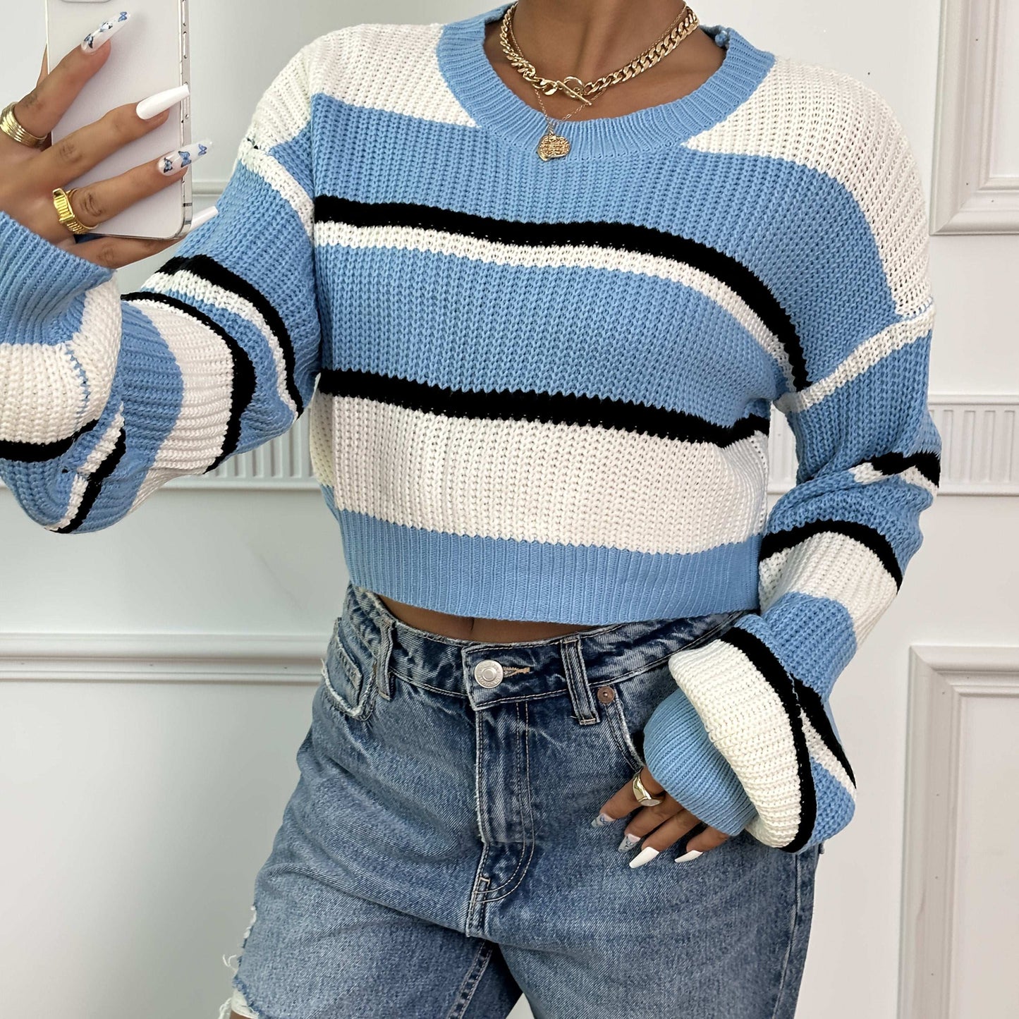 Maglione cropped a righe con maniche lunghe