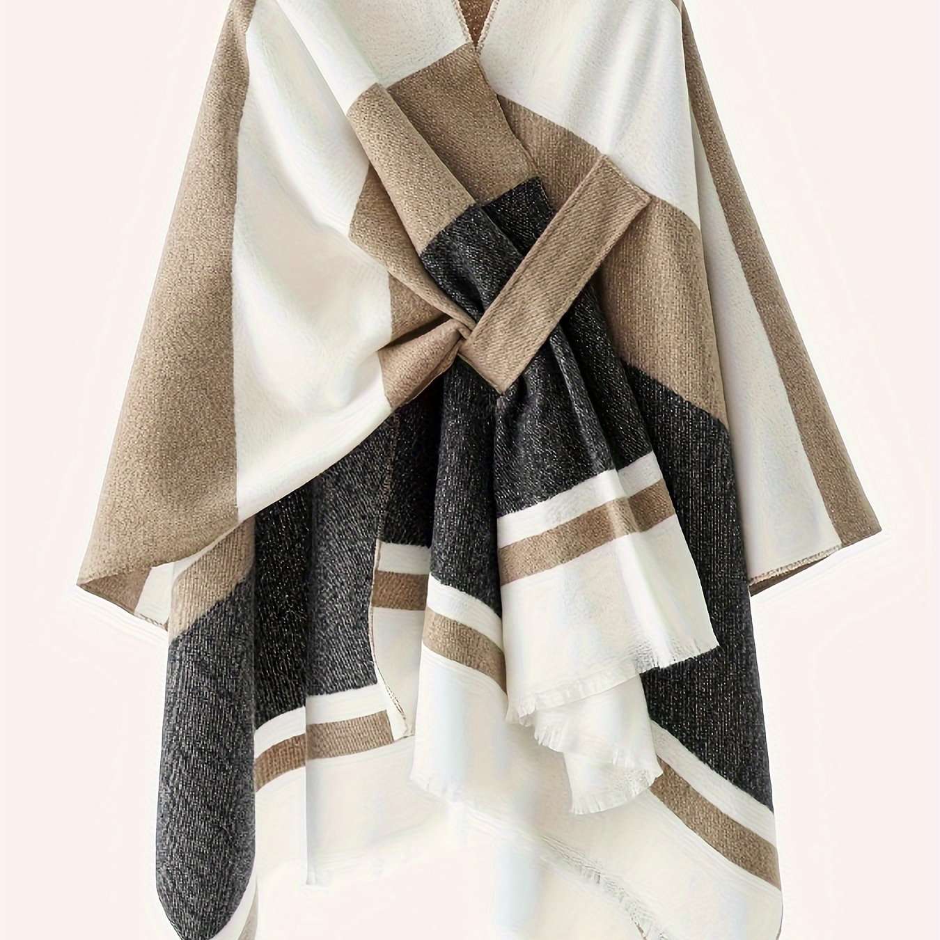 Poncho elegante con design geometrico e cintura frontale