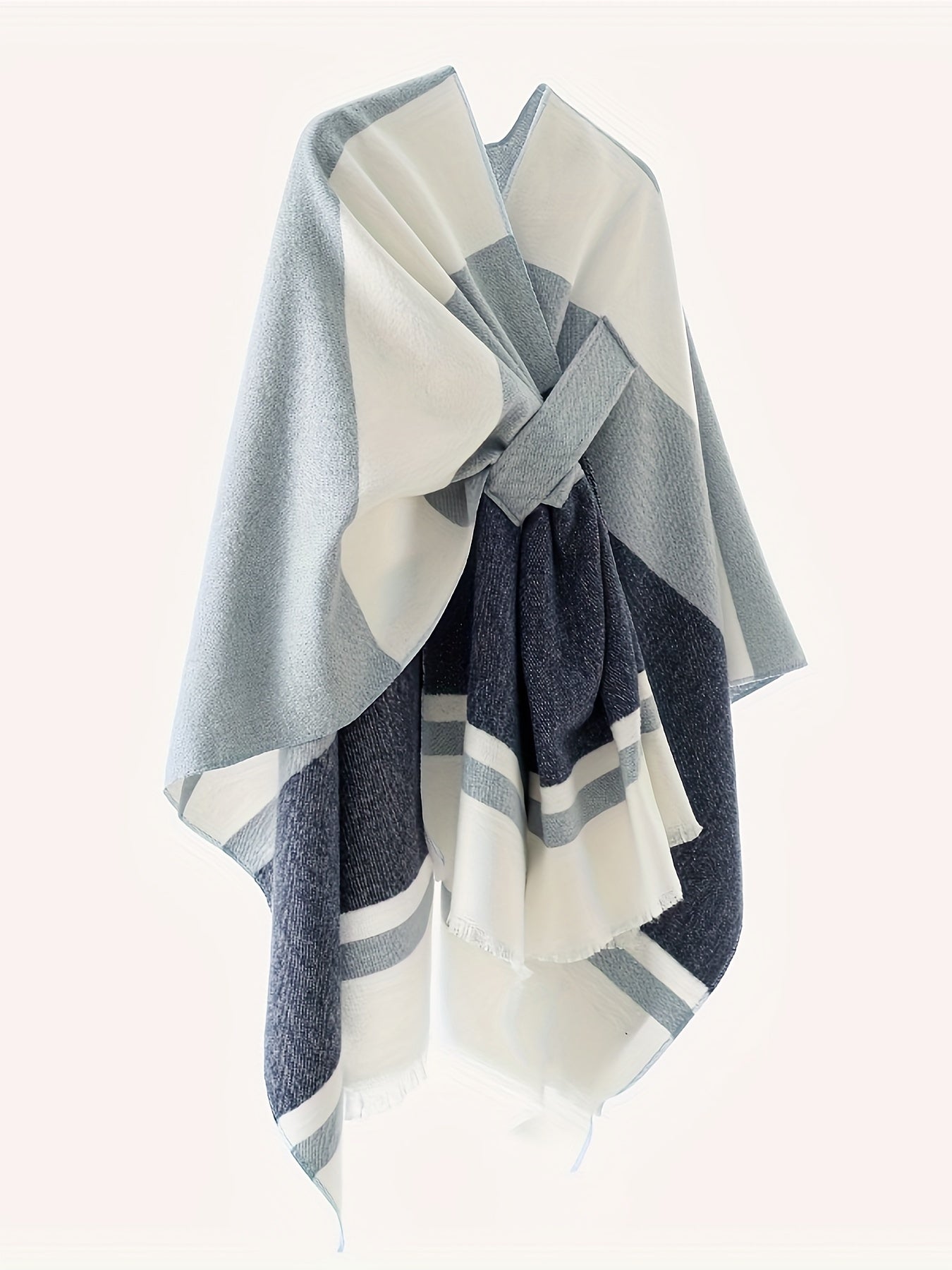 Poncho elegante con design geometrico e cintura frontale